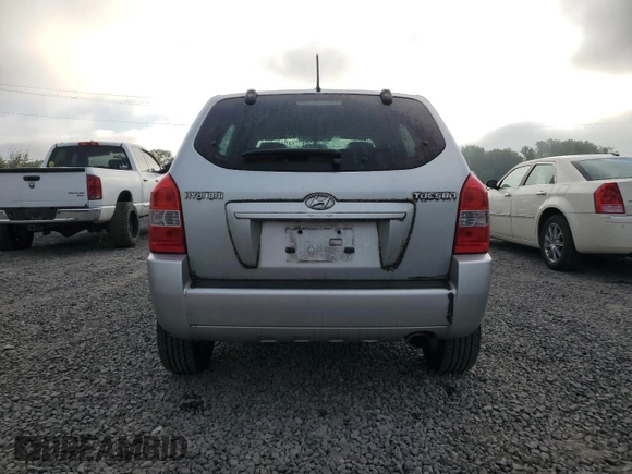 2009 Hyundai Tucson GLS with VIN KM8JM12B79U113216, listed as a Copart auction lot 75191434 with 132,677 mi miles and Salvage Title. Bid and sale history available at carsss.com. Image 6.