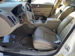 2010 Cadillac STS AWD z VIN 1G6DU6EV0A0101850, wystawiony jako Copart lot #83113264 z przebiegiem 103 491 mil mil oraz Szkoda całkowita • Salvage title. Historia ofert i sprzedaży dostępna na DreamBid. Obrazek 7.