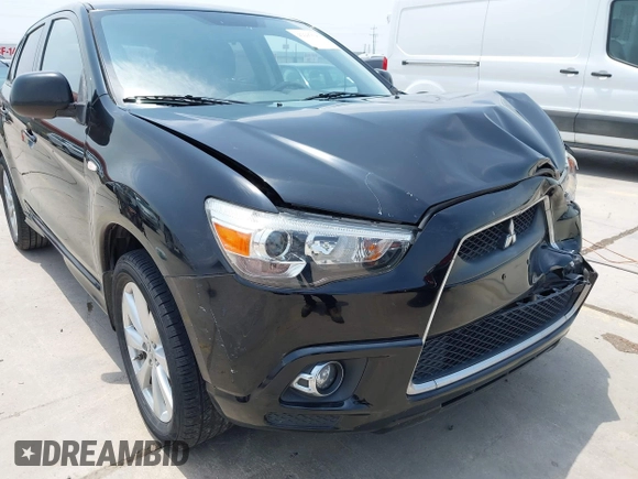 2012 Mitsubishi Outlander SE with VIN JA4AP4AU1CZ002844, listed as a IAAI auction lot 42297590 with 66,065 mi miles and . Bid and sale history available at DreamBid. Image 17.