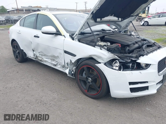 2019 Jaguar XE 25t with VIN SAJAS4FX3KCP52756, listed as a IAAI auction lot 41826575 with 71,252 mi miles. Bid and sale history available at carsss.com. Image 6.