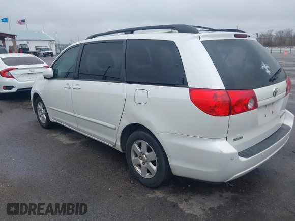 2010 Toyota Sienna XLE with VIN 5TDYK4CC1AS330349, listed as a IAAI auction lot 41607065 with 258,145 mi miles and . Bid and sale history available at carsss.com. Image 14.