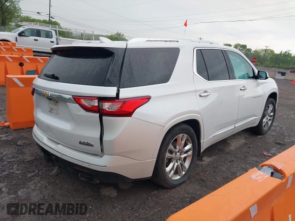 2018 Chevrolet Traverse High Country with VIN 1GNEVKKW4JJ133786, listed as a IAAI auction lot 42076685 with 167,787 mi miles and . Bid and sale history available at DreamBid. Image 4.