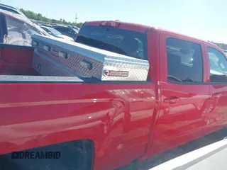 2018 Chevrolet Silverado 1500 LT with VIN 1GCUKREC0JF222376, listed as a IAAI auction lot 42121748 with 143,472 mi miles and . Bid and sale history available at DreamBid. Image 5.