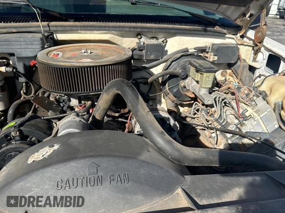 1993 GMC Yukon with VIN 1GKEK18K9PJ718702, listed as a Copart auction lot 82847154 with 103,848 mi miles and Clean Title. Bid and sale history available at carsss.com. Image 7.