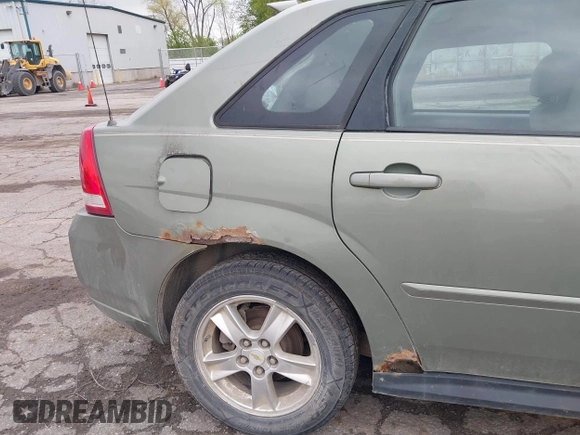 2005 Chevrolet Malibu Maxx LS z VIN 1G1ZT62805F185667, wystawiony jako IAAI lot #42201296 z przebiegiem 190 893 mil mil oraz . Historia ofert i sprzedaży dostępna na DreamBid. Obrazek 14.