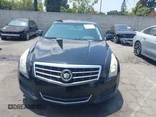 2013 Cadillac ATS z VIN 1G6AA5RA1D0179071, wystawiony jako IAAI lot #42438437 z przebiegiem 97 558 mil mil oraz . Historia ofert i sprzedaży dostępna na DreamBid. Obrazek 13.