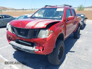 2015 Nissan Frontier SL with VIN 1N6AD0EV1FN711521, listed as a IAAI auction lot 42525352 with 203,114 mi miles and . Bid and sale history available at DreamBid. Image 2.