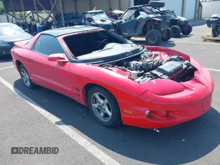 2002 Pontiac Firebird with VIN 2G2FS22K122169318, listed as a IAAI auction lot 40006885 with 115,799 mi miles. Bid and sale history available at carsss.com. Image 1.