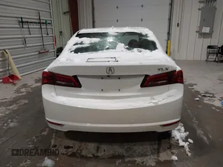 2016 Acura TLX with VIN 19UUB1F32GA015947, listed as a IAAI auction lot 41495180 with 101,789 mi miles. Bid and sale history available at carsss.com. Image 16.