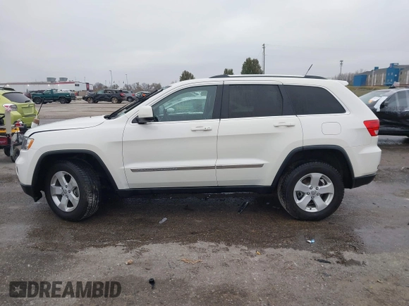 2012 Jeep Grand Cherokee Laredo with VIN 1C4RJFAG6CC297958, listed as a IAAI auction lot 40859811 with 213,499 mi miles. Bid and sale history available at carsss.com. Image 14.