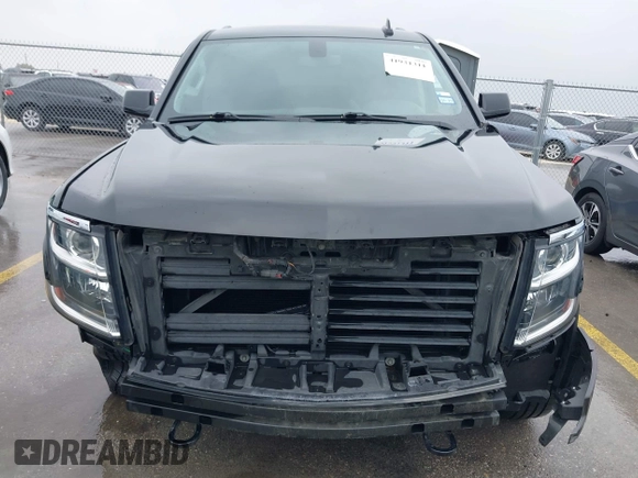 2020 Chevrolet Tahoe LS with VIN 1GNSCAKC5LR275173, listed as a IAAI auction lot 41931311 with 86,780 mi miles and . Bid and sale history available at DreamBid. Image 13.