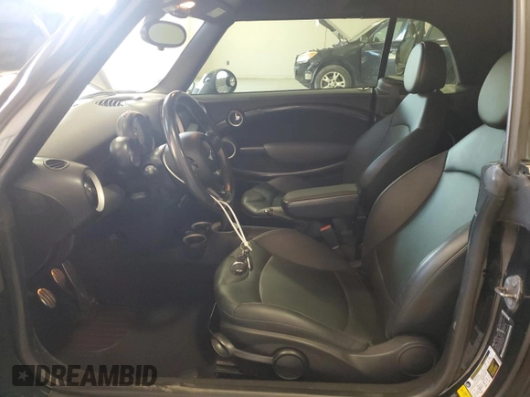 2012 MINI Convertible S с VIN WMWZP3C51CT296318, выставлен на аукционе Copart как лот 47701405 с пробегом 78 842 миль миль и Списание • Salvage title. История ставок и продаж доступна на DreamBid. Изображение 7.