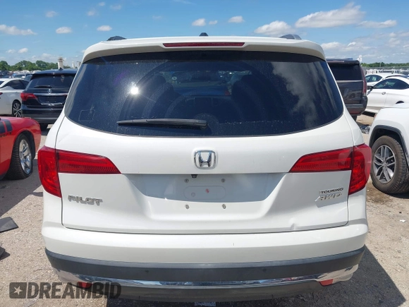 2017 Honda Pilot Touring with VIN 5FNYF6H92HB054145, listed as a IAAI auction lot 42200391 with 70,096 mi miles and . Bid and sale history available at DreamBid. Image 16.