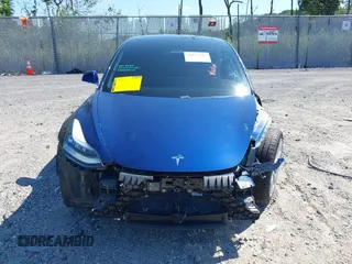 2019 Tesla Model 3 Mid Range with VIN 5YJ3E1EA6KF402308, listed as a IAAI auction lot 40077902 with 89,794 mi miles and . Bid and sale history available at carsss.com. Image 12.