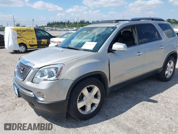 2007 GMC Acadia SLT with VIN 1GKEV33727J126936, listed as a IAAI auction lot 42059595 with 129,700 mi miles. Bid and sale history available at carsss.com. Image 2.