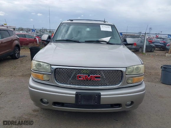2004 GMC Yukon XL Denali with VIN 1GKFK66U64J169736, listed as a IAAI auction lot 41794342 with 249,043 mi miles. Bid and sale history available at carsss.com. Image 6.