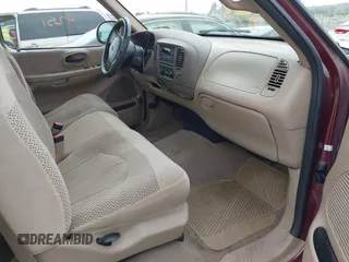 1999 Ford F-150 Work Series with VIN 1FTRF17W7XNA96857, listed as a IAAI auction lot 42119251 with 388,575 mi miles. Bid and sale history available at carsss.com. Image 5.