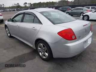 2009 Pontiac G6 1SB z VIN 1G2ZJ57B994252266, wystawiony jako IAAI lot #41609938 z przebiegiem 162 412 mil mil oraz . Historia ofert i sprzedaży dostępna na DreamBid. Obrazek 3.