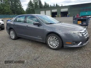 2012 Ford Fusion Hybrid with VIN 3FADP0L33CR398060, listed as a Copart auction lot 65532975 with 124,780 mi miles and Salvage title. Bid and sale history available at DreamBid. Image 4.