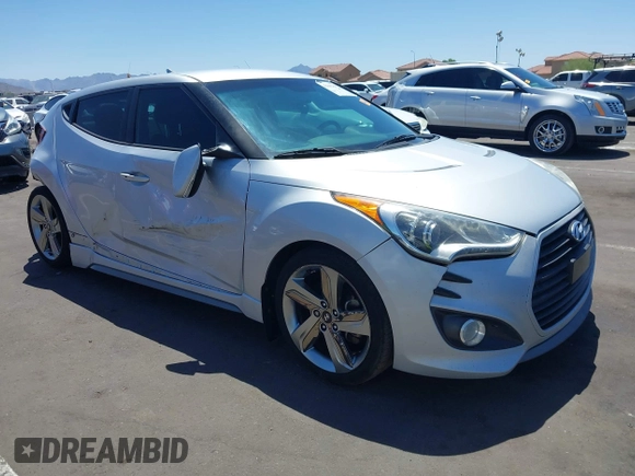 2013 Hyundai Veloster Turbo z VIN KMHTC6AE0DU177983, wystawiony jako IAAI lot #42292102 z przebiegiem 121 142 mil mil oraz . Historia ofert i sprzedaży dostępna na DreamBid. Obrazek 1.