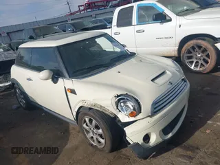 2007 MINI Hardtop with VIN WMWMF33587TT52466, listed as a IAAI auction lot 41964371 with 129,842 mi miles and . Bid and sale history available at DreamBid. Image 1.