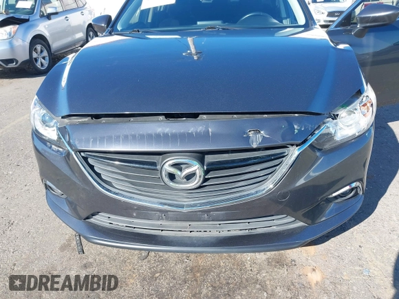 2016 Mazda 6 i Sport with VIN JM1GJ1U53G1400940, listed as a IAAI auction lot 41687400 with 77,737 mi miles and . Bid and sale history available at DreamBid. Image 6.