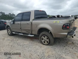 2003 Ford F-150 XLT with VIN 1FTRW08L83KB61404, listed as a Copart auction lot 51869675 with 22,216 mi miles and Salvage Title. Bid and sale history available at carsss.com. Image 2.
