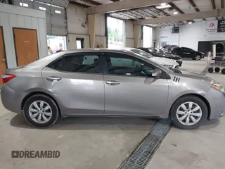2016 Toyota Corolla L z VIN 2T1BURHE8GC532887, wystawiony jako IAAI lot #42509172 z przebiegiem 91 720 mil mil oraz . Historia ofert i sprzedaży dostępna na DreamBid. Obrazek 13.