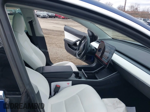 2020 Tesla Model 3 Long Range with VIN 5YJ3E1EB9LF601198, listed as a IAAI auction lot 41744287 with 70,322 mi miles and . Bid and sale history available at DreamBid. Image 5.