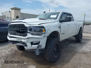 2023 Ram 2500 Laramie with VIN 3C6UR5FL3PG553812, listed as a IAAI auction lot 39891964 with 33,303 mi miles. Bid and sale history available at carsss.com. Image 18.