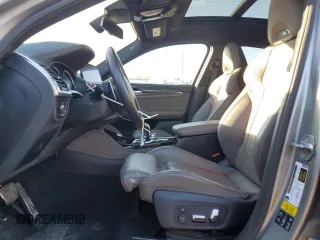 2020 BMW X4 M Competition z VIN 5YMUJ0C02L9C47802, wystawiony jako Copart lot #88896685 z przebiegiem Nie podano mil oraz Szkody całkowita. Historia ofert i sprzedaży dostępna na DreamBid. Obrazek 7.