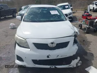 2009 Toyota Corolla with VIN 1NXBU40E59Z023792, listed as a IAAI auction lot 41743473 with 128,454 mi miles. Bid and sale history available at carsss.com. Image 12.