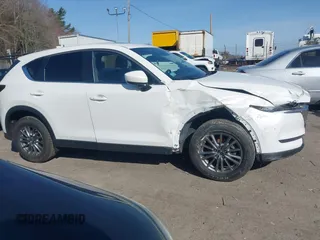 2017 Mazda CX-5 Touring z VIN JM3KFBCL8H0214052, wystawiony jako IAAI lot #41940783 z przebiegiem 120 083 mil mil oraz . Historia ofert i sprzedaży dostępna na DreamBid. Obrazek 12.