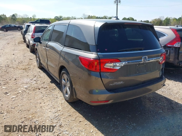 2020 Honda Odyssey EX with VIN 5FNRL6H59LB068868, listed as a IAAI auction lot 41930832 with 64,872 mi miles and . Bid and sale history available at DreamBid. Image 3.