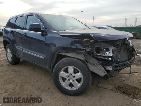 2013 Jeep Grand Cherokee Laredo with VIN 1C4RJEAG1DC584166, listed as a Copart auction lot 52785975 with 210,961 mi miles and Clean Title. Bid and sale history available at carsss.com. Image 4.