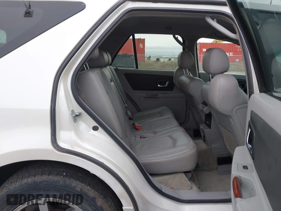 2004 Cadillac SRX with VIN 1GYDE63A440119602, listed as a IAAI auction lot 41368846 with 162,261 mi miles. Bid and sale history available at carsss.com. Image 8.