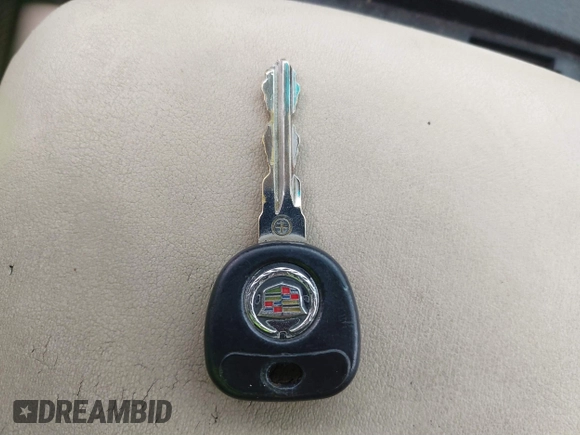 2008 Cadillac CTS AWD z VIN 1G6DG577280155483, wystawiony jako IAAI lot #41723609 z przebiegiem 132 756 mil mil oraz . Historia ofert i sprzedaży dostępna na DreamBid. Obrazek 11.