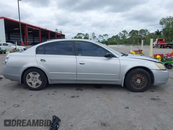2004 Nissan Altima S with VIN 1N4AL11D04C130857, listed as a IAAI auction lot 41661519 with 147,518 mi miles. Bid and sale history available at carsss.com. Image 14.