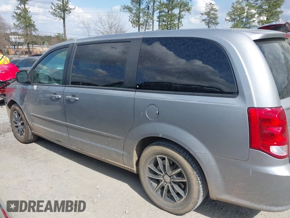 2015 Dodge Grand Caravan American Value with VIN 2C4RDGBG6FR576897, listed as a IAAI auction lot 41780897 with 159,823 mi miles and . Bid and sale history available at DreamBid. Image 14.