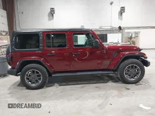 2021 Jeep Wrangler Unlimited Sport S with VIN 1C4HJXDN1MW596334, listed as a IAAI auction lot 41730278 with 64,126 mi miles and . Bid and sale history available at DreamBid. Image 14.