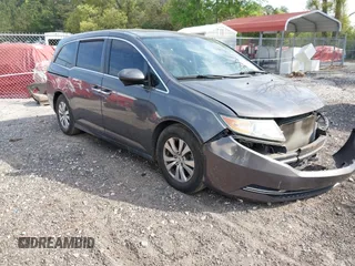 2014 Honda Odyssey EX-L z VIN 5FNRL5H60EB120877, wystawiony jako IAAI lot #42061130 z przebiegiem 215 356 mil mil oraz . Historia ofert i sprzedaży dostępna na DreamBid. Obrazek 1.