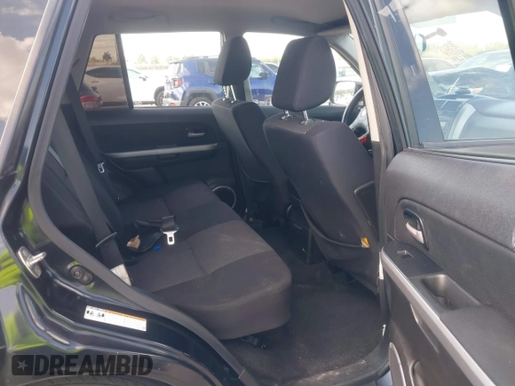 2008 Suzuki Grand Vitara with VIN JS3TE941284102380, listed as a IAAI auction lot 42061609 with 103,554 mi miles and . Bid and sale history available at DreamBid. Image 8.