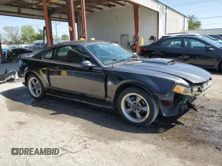 2004 Ford Mustang Standard with VIN 1FAFP40484F121187, listed as a Copart auction lot 52728965 with 175,692 mi miles and Salvage Title. Bid and sale history available at carsss.com. Image 4.