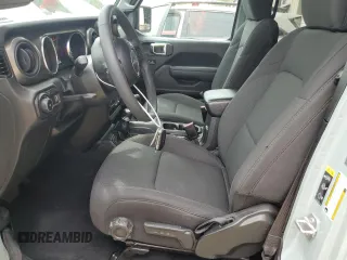 2023 Jeep Wrangler Sport with VIN 1C4HJXDN0PW643485, listed as a Copart auction lot 59783564 with 14,001 mi miles and Salvage Title. Bid and sale history available at DreamBid. Image 7.