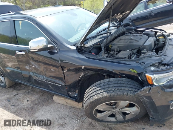 2016 Jeep Grand Cherokee Overland with VIN 1C4RJFCG5GC343752, listed as a IAAI auction lot 42138080 with 86,777 mi miles and . Bid and sale history available at DreamBid. Image 6.