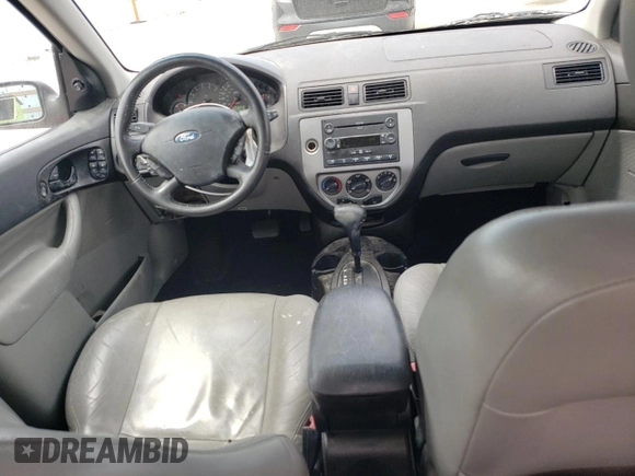 2007 Ford Focus S z VIN 1FAHP37N47W245222, wystawiony jako Copart lot #57293025 z przebiegiem 102 552 mil mil oraz Szkoda całkowita • Salvage title. Historia ofert i sprzedaży dostępna na DreamBid. Obrazek 8.