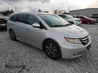 2014 Honda Odyssey Touring with VIN 5FNRL5H90EB096137, listed as a Copart auction lot 47192275 with 164,620 mi miles and Salvage Title. Bid and sale history available at DreamBid. Image 4.