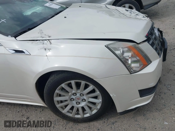 2012 Cadillac CTS Luxury with VIN 1G6DF5E55C0127450, listed as a IAAI auction lot 42020764 with 150,597 mi miles and . Bid and sale history available at DreamBid. Image 12.