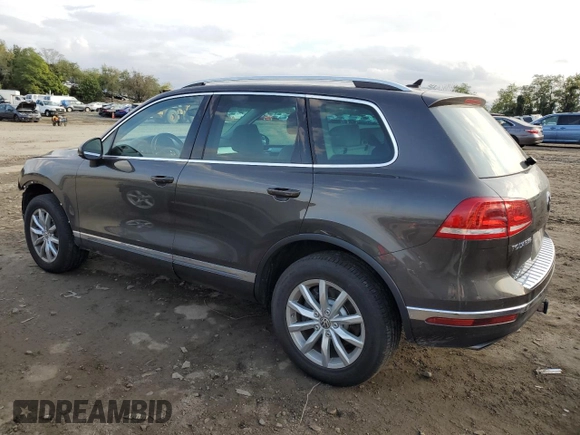 2017 Volkswagen Touareg Sport with VIN WVGEF7BP0HD005996, listed as a Copart auction lot 72883304 with 66,167 mi miles and Salvage Title. Bid and sale history available at DreamBid. Image 2.