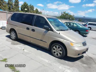 2001 Honda Odyssey LX with VIN 2HKRL18501H610649, listed as a IAAI auction lot 42799158 with 197,944 mi miles and . Bid and sale history available at DreamBid. Image 1.